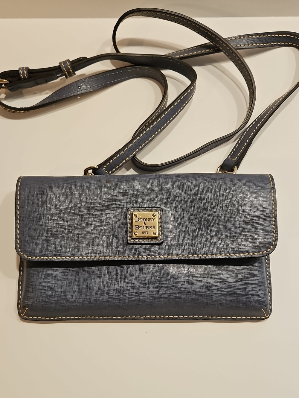 DOONEY & BOURKE GRAY BLUE WRISTLET OR CROSS BODY WITH GOLD HARDWARE